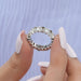 [A Women Holding Olive Oval Full Eternity Ring]-[Ouros Jewels]