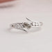 Front view of olive pear shaped diamond bypass ring. This engagement ring inspired by wedding ring.