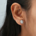 In ear look of oval shaped diamond stud earrings made with claw prongs 
