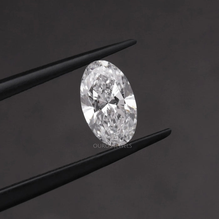 [In Tweezer View Of 1 Carat Long Oval Cut Lab Grown Diamond]-[Ouros Jewels]