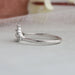 14k white gold shank of pear cut curved diamond wedding ring
