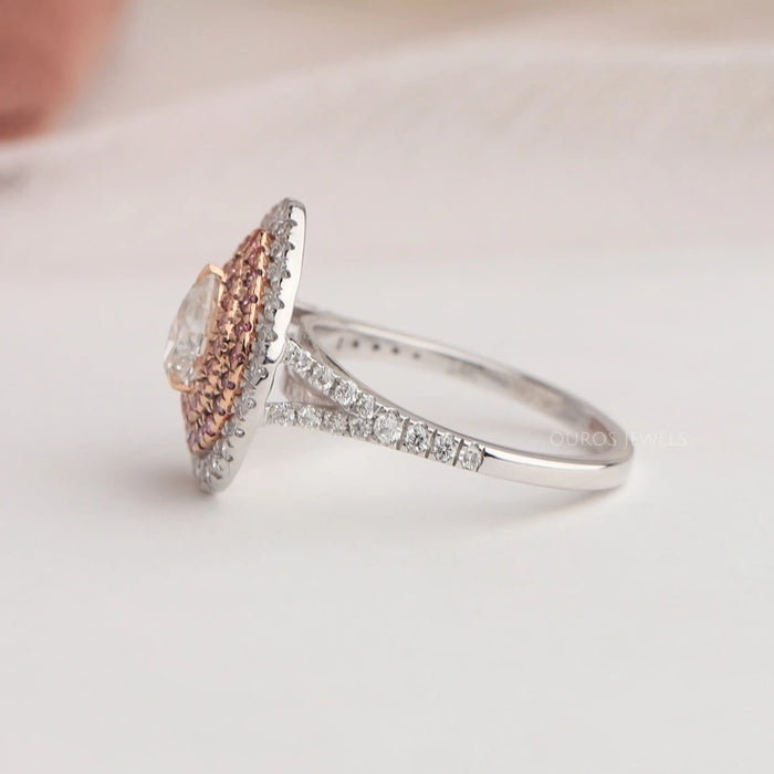 Round diamond studded on 14k white gold split shank of pear shaped 3 halo diamond ring