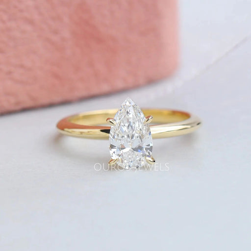 1 carat Pear Cut Solitaire Engagement Ring Made With 18K Yellow Gold