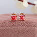 A close up look of rose gold diamond stud earrings, a perfect anniversary gift for your partner