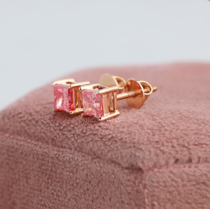 Side look of princess cut eco-friendly diamond earrings in 14kt rose gold