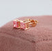 Side look of princess cut eco-friendly diamond earrings in 14kt rose gold