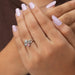 In finger look of pink round lab created diamond bypass set engagement ring