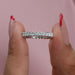 A close up look of eco friendly diamond wedding band with princess cut diamonds