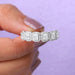 Close up look of radiant cut diamond engagement ring with halo setting