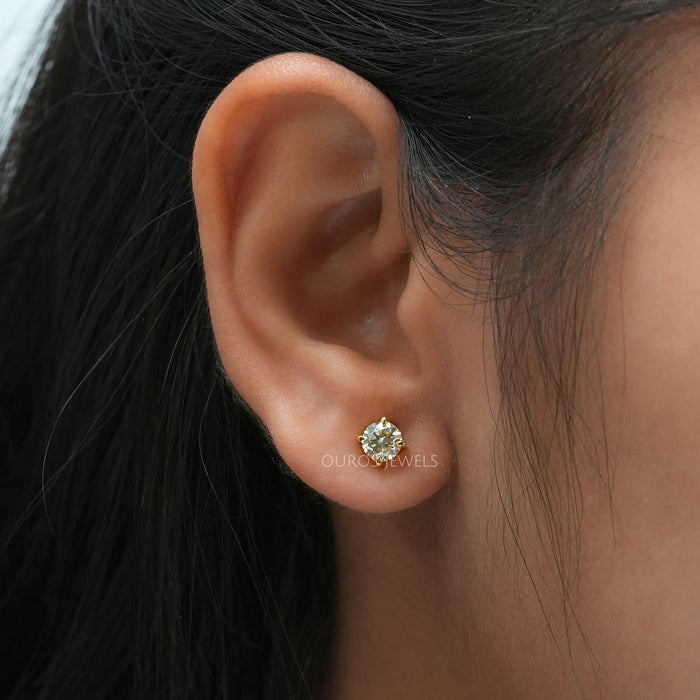 Round brilliant cut lab created diamond stud earrings in ear look