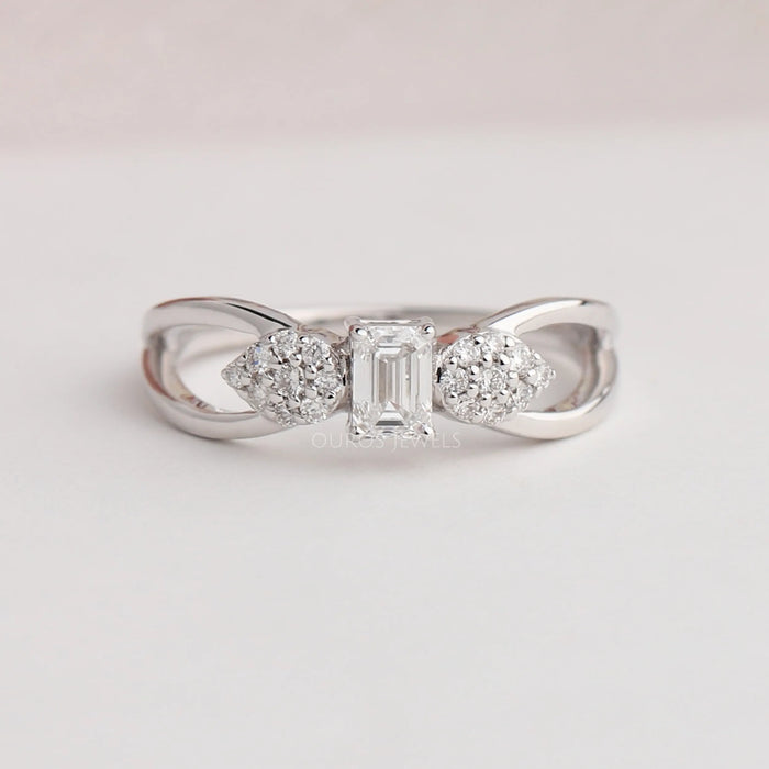 Front view of 3 stone emerald cut diamond engagement ring crafted with beautifully round cut diamonds in 14k white gold.