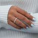 In finger look of antique half eternity wedding band made with trillion and baguette cut diamonds