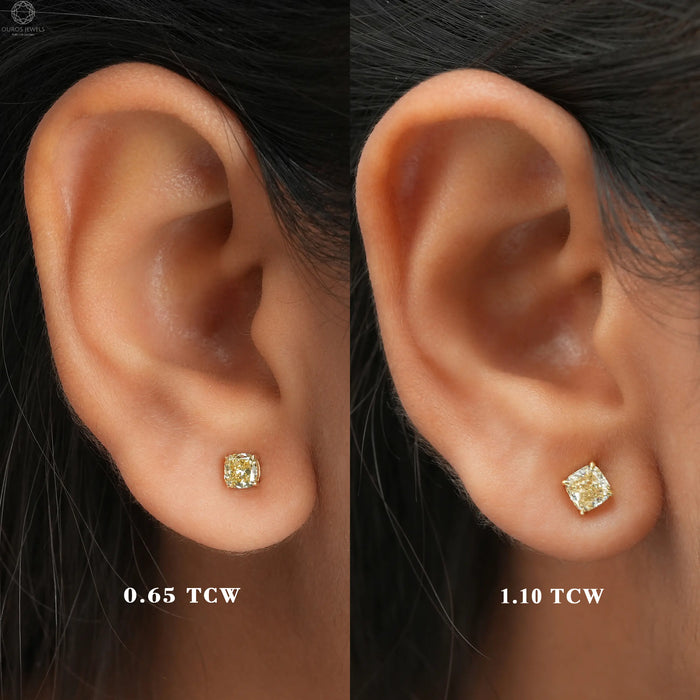 Different carat sizes available of yellow cushion lab manufactured diamond earrings with four claw prongs setting 