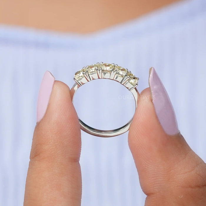 A close look of cushion cut 5 stone diamond ring 
