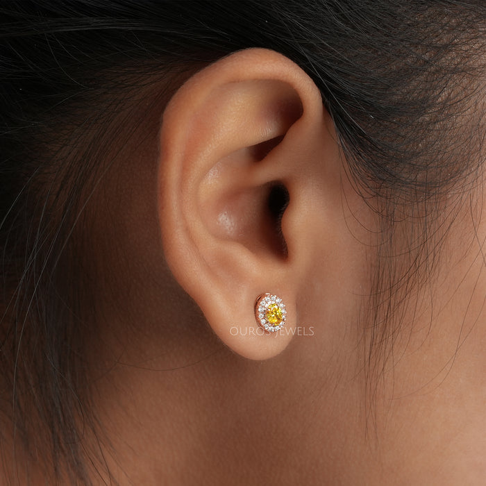 Yellow Oval Cut Halo Stud Earrings