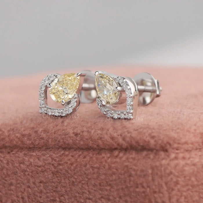 White gold lab diamond earring with fancy yellow pear shaped diamonds set with claw prongs
