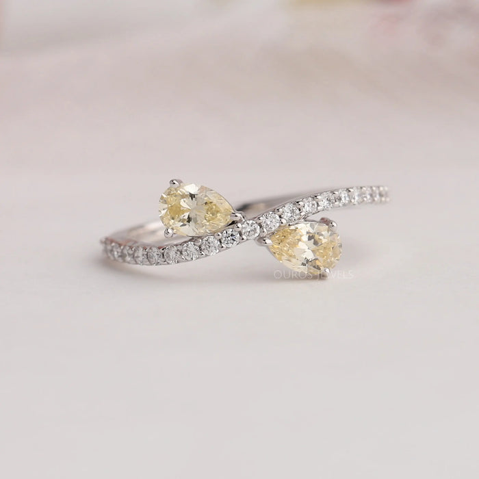 Fancy Yellow Pear Diamond Ring With Round Brilliant Cut Accent Stones