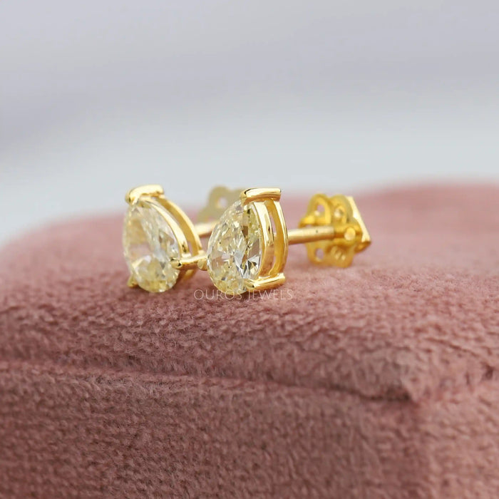 Lustrous 14K Yellow Gold Screw Back Earring with pear shaped lab diamonds