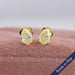 Yellow pear cut lab grown diamond solitaire stud earrings in 14k yellow gold